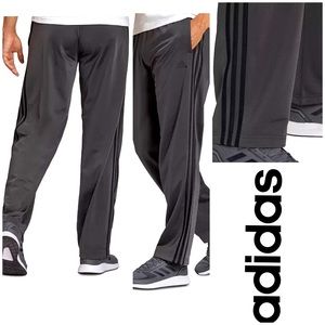 ADIDAS -  Primegreen Essentials Warm Up Three Stripe Track Pant. Size M